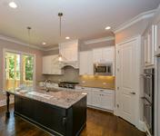 Kitchen Open to Family Room in The Williston built by Waterford Homes in Sandy Springs